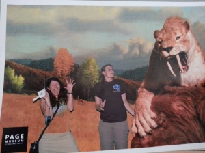 Our souvenir photo from the La Brea Tar Pits (Sabertooth tiger ate my middle)